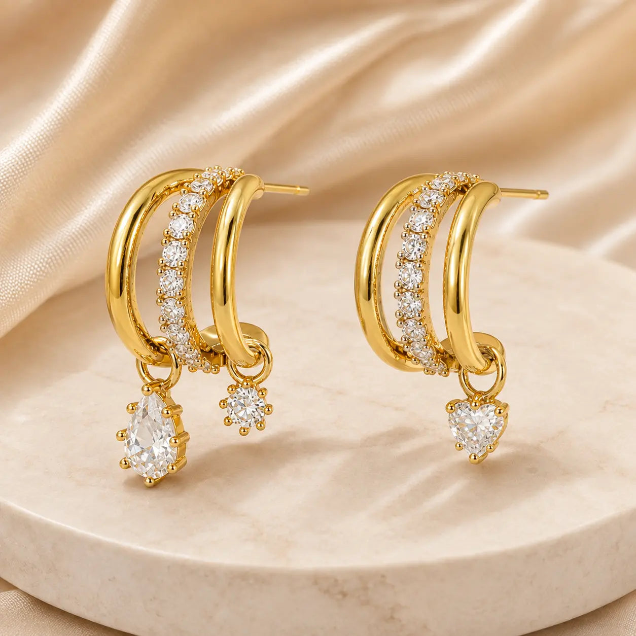 The Three Wishes™ Asymmetric Sparkle Hoop Earrings, One Piercing, A Whole Look — Asymmetric Triple-Row Sparkle Hoop Earrings with Floating Pear, Round & Heart Charms | Gold or Silver | Last Day Sale-90% OFF🔥