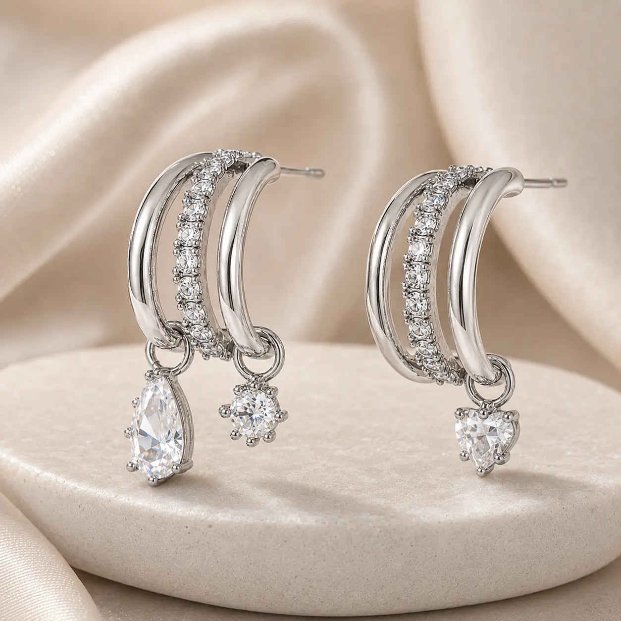 The Three Wishes™ Asymmetric Sparkle Hoop Earrings, One Piercing, A Whole Look — Asymmetric Triple-Row Sparkle Hoop Earrings with Floating Pear, Round & Heart Charms | Gold or Silver | Last Day Sale-90% OFF🔥